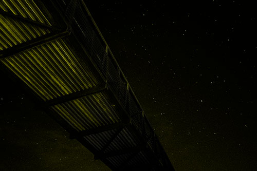 Stars Shining Above Walkway Bridge (Yellow Tone Photo)