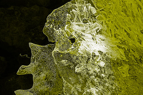 Two Faced Optical Illusion Ice Face Hanging Above River (Yellow Tone)