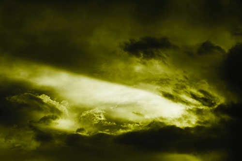 White Light Tearing Through Clouds (Yellow Tone Photo)